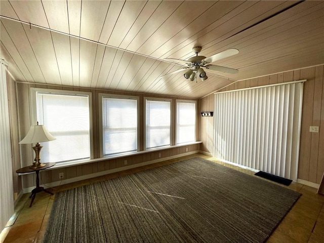 unfurnished sunroom featuring wood ceiling, lofted ceiling, and ceiling fan