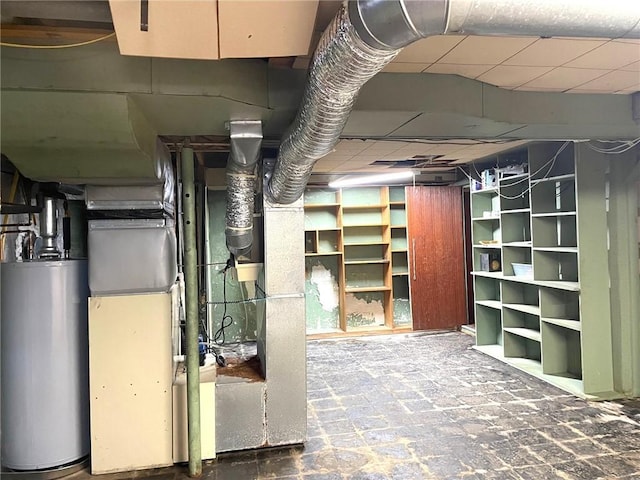 unfinished basement featuring heating unit, a paneled ceiling, and water heater