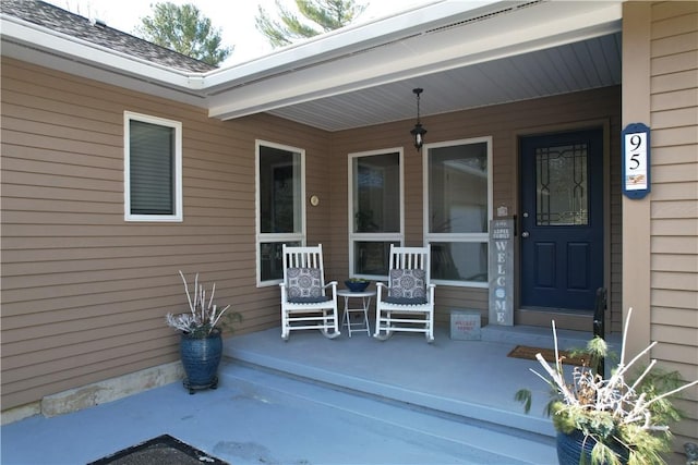 entrance to property with a porch