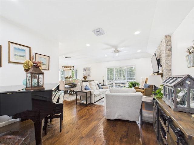 living room with recessed lighting, visible vents, ceiling fan, and dark wood-style flooring