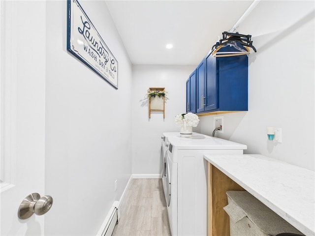 laundry room featuring independent washer and dryer, light wood-style flooring, recessed lighting, cabinet space, and baseboards