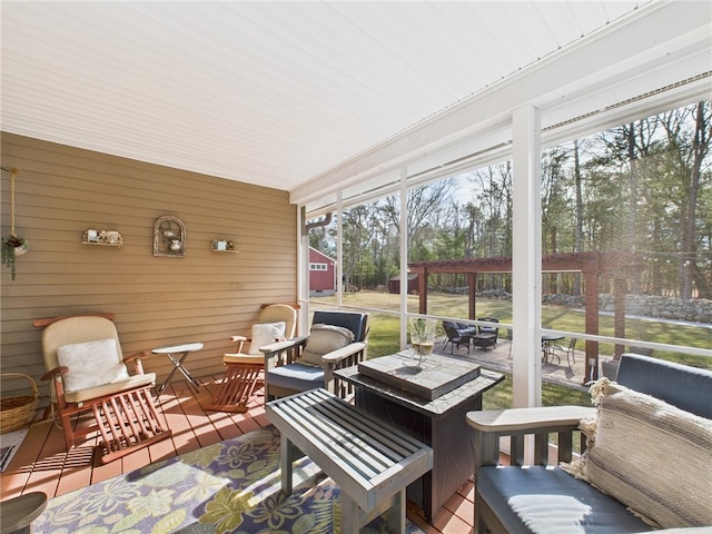 sunroom / solarium featuring plenty of natural light