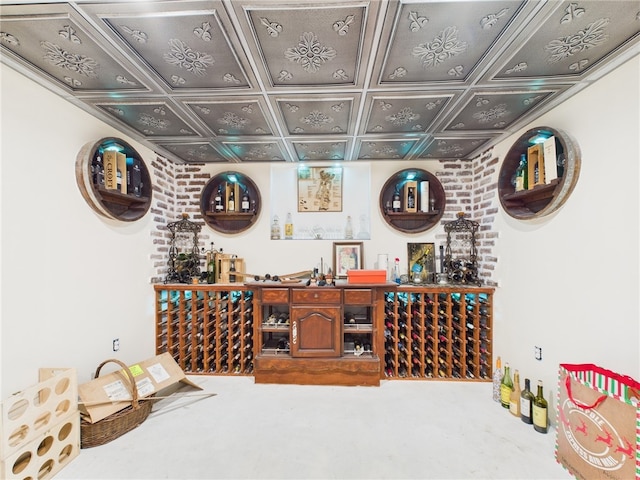 wine cellar with an ornate ceiling