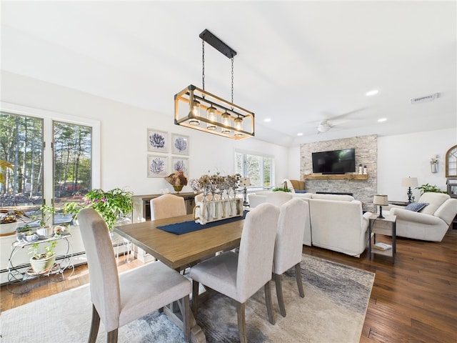 dining area with visible vents, dark wood finished floors, a fireplace, recessed lighting, and ceiling fan