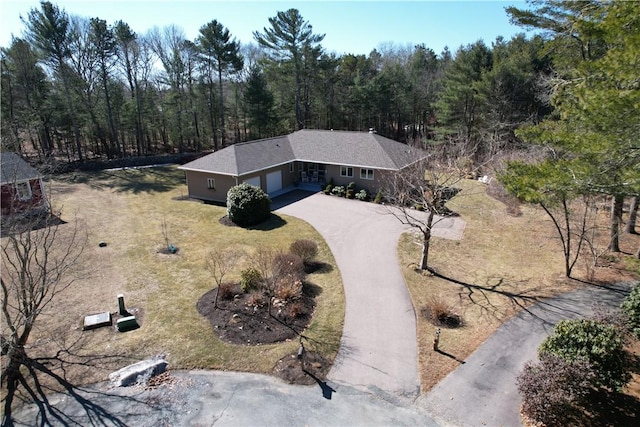 aerial view featuring a view of trees