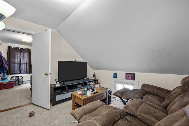 living room featuring vaulted ceiling and light carpet