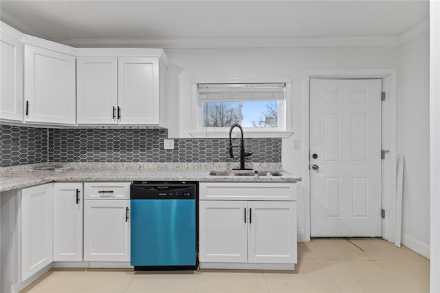 kitchen featuring crown molding, dishwasher, decorative backsplash, white cabinets, and a sink