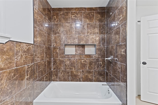 bathroom featuring washtub / shower combination