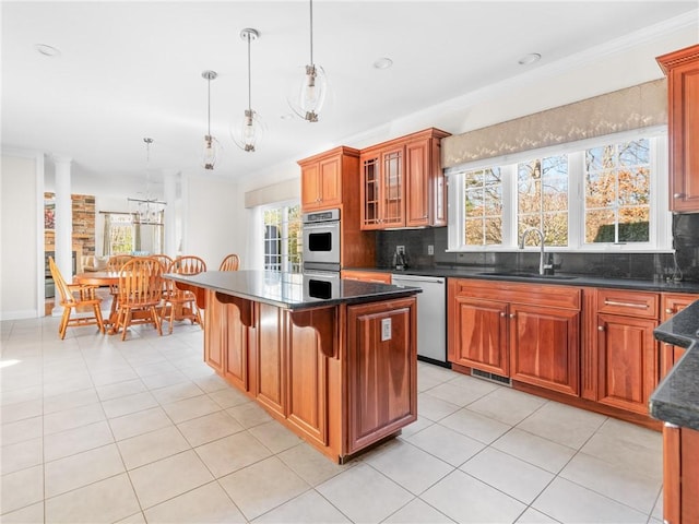 kitchen with tasteful backsplash, ornamental molding, dishwasher, and a sink