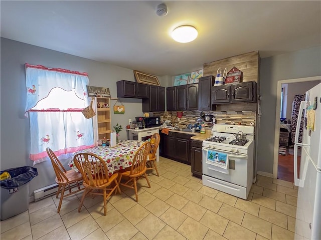 kitchen featuring white appliances, dark brown cabinets, light countertops, and tasteful backsplash