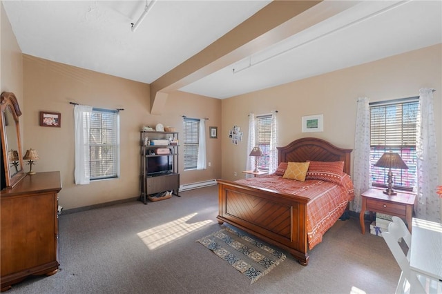 carpeted bedroom featuring beam ceiling and baseboards