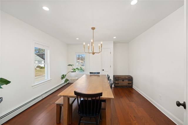 dining room with baseboards, recessed lighting, dark wood-type flooring, a notable chandelier, and baseboard heating