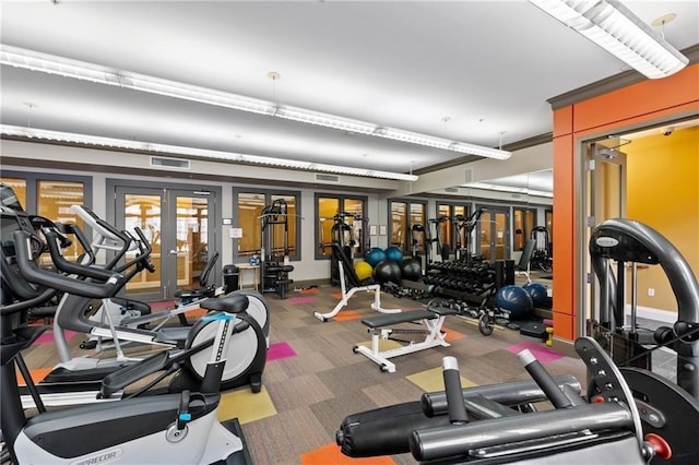 workout area with french doors, carpet floors, and visible vents