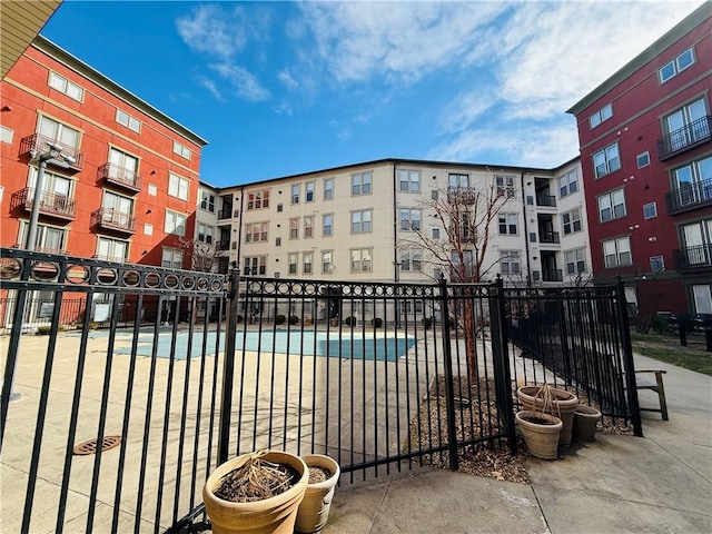 view of pool with fence