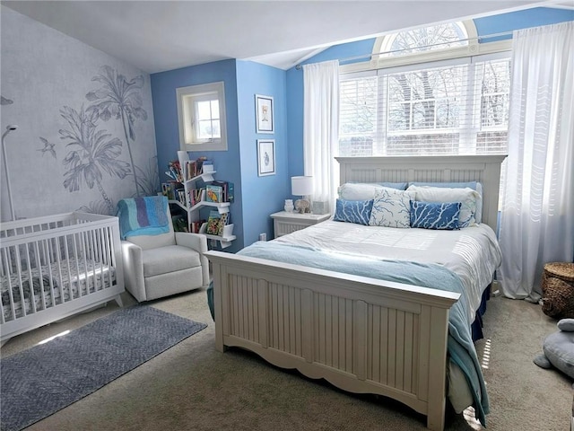 bedroom featuring carpet and wallpapered walls