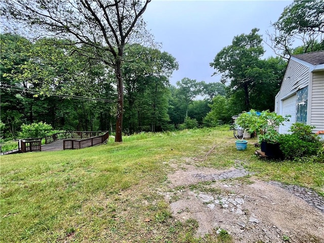 view of yard featuring a garage