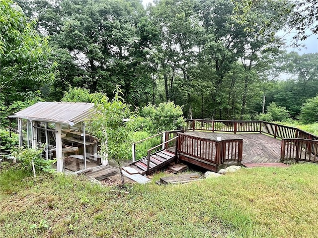 deck featuring a lawn