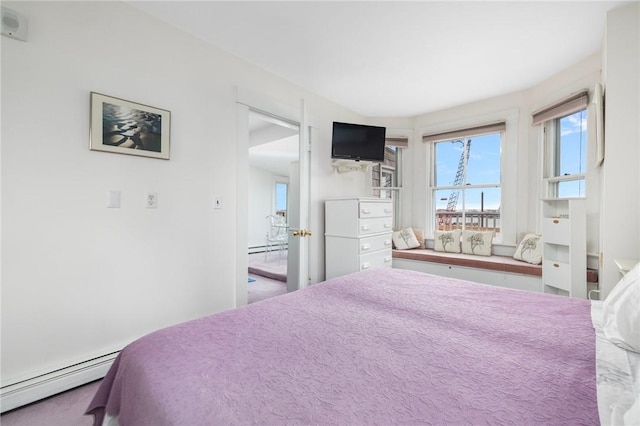 bedroom featuring a baseboard radiator