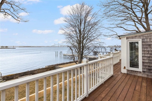 deck featuring a water view