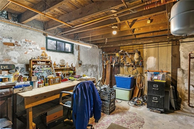 basement with a workshop area