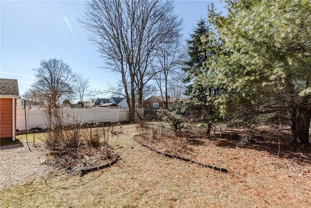 view of yard with fence