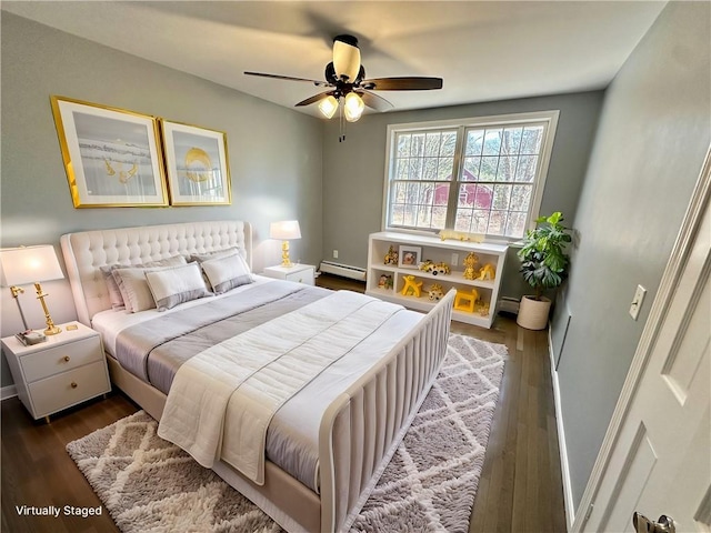 bedroom featuring a baseboard heating unit, ceiling fan, wood finished floors, and a baseboard radiator