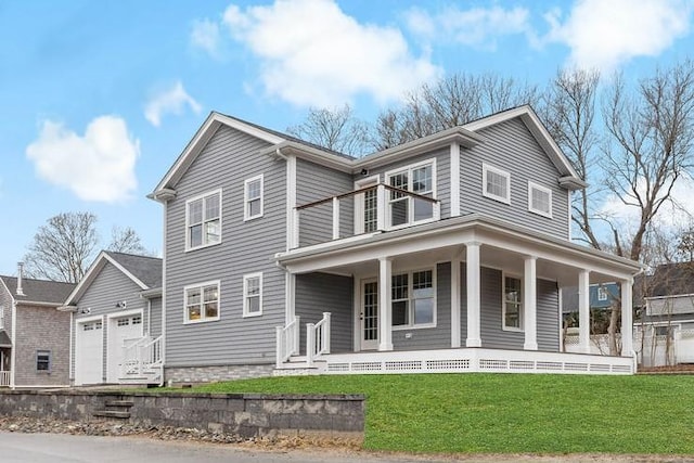 view of front of property featuring an attached garage, a balcony, a porch, and a front yard