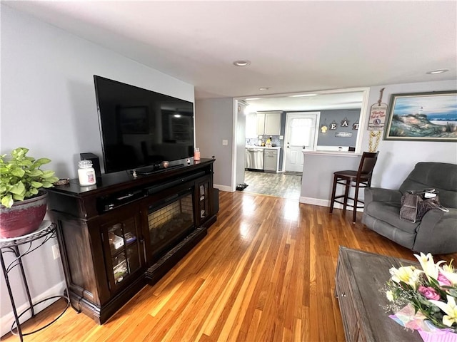 living room featuring light wood-style flooring