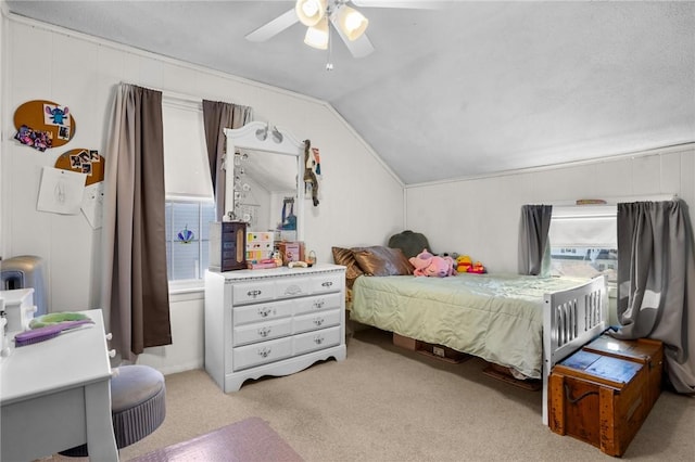 bedroom featuring light colored carpet, ceiling fan, and vaulted ceiling