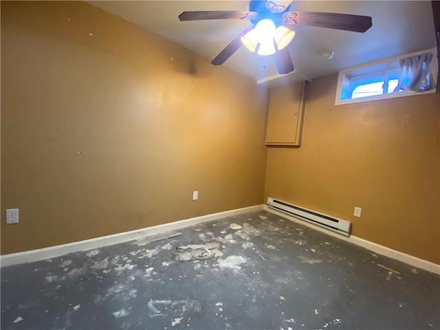 basement with baseboards and a baseboard radiator