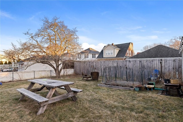 view of yard with a fenced backyard