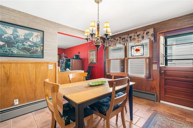 dining space with a notable chandelier and a baseboard radiator