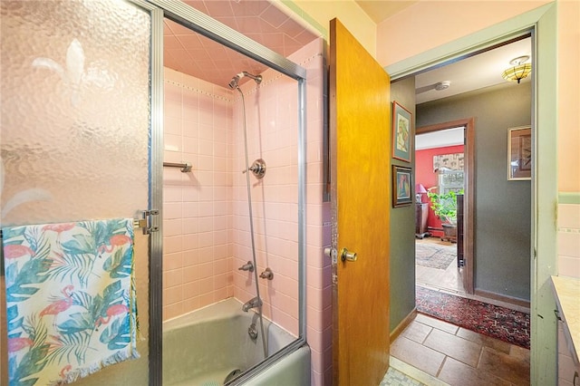 full bathroom featuring baseboards and enclosed tub / shower combo