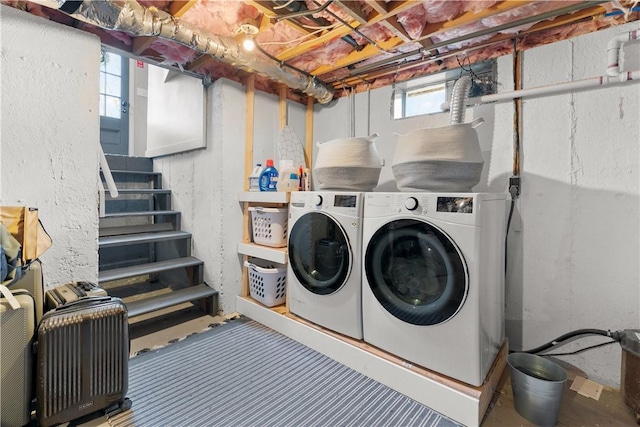 laundry room with washing machine and dryer and laundry area