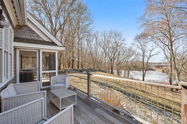 wooden terrace with a sunroom