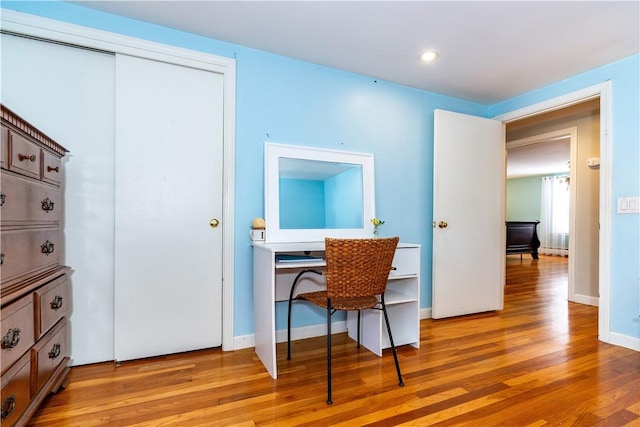 home office featuring recessed lighting, baseboards, and light wood-style floors