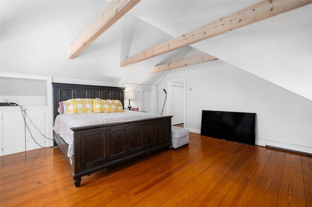 bedroom featuring wood finished floors