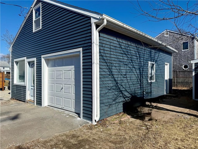 garage featuring fence