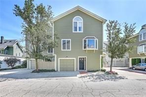 view of front of property featuring a garage