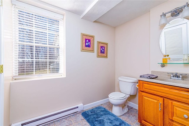 bathroom featuring a baseboard heating unit, toilet, baseboards, and tile patterned flooring