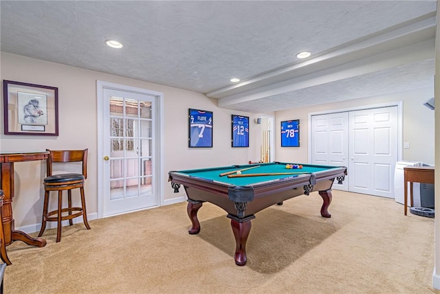 playroom featuring carpet flooring, recessed lighting, baseboards, and a textured ceiling