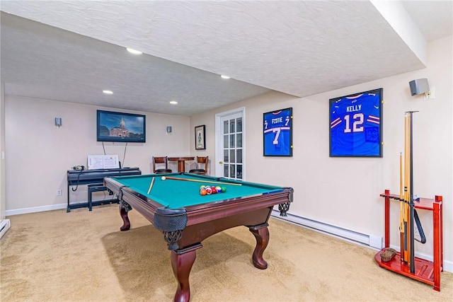 rec room featuring baseboards, recessed lighting, a textured ceiling, a baseboard heating unit, and carpet flooring