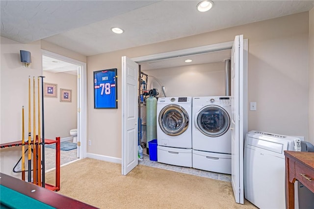 laundry room with washing machine and clothes dryer, baseboards, light colored carpet, laundry area, and recessed lighting