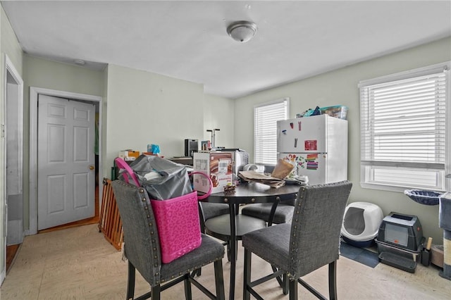 dining area featuring plenty of natural light