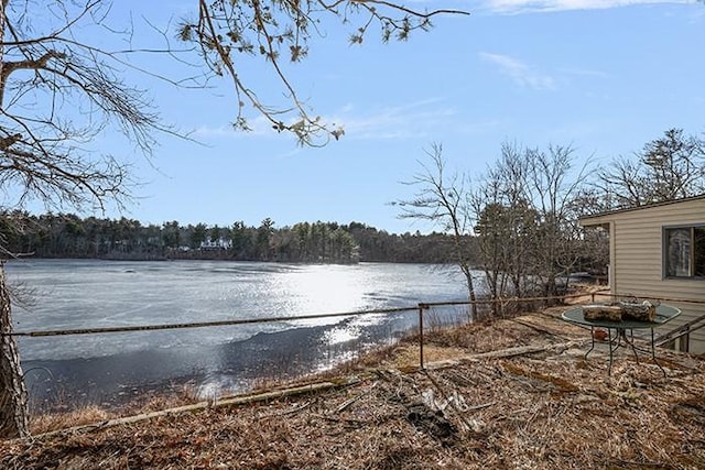 view of water feature featuring fence