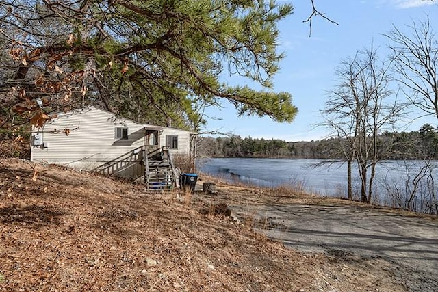 exterior space featuring a water view