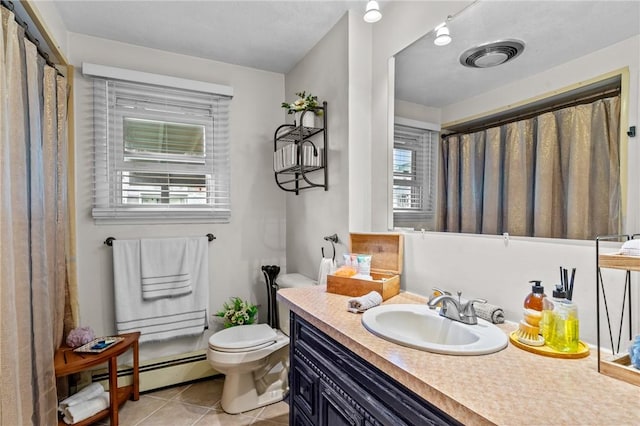 full bathroom with vanity, visible vents, a baseboard heating unit, tile patterned floors, and toilet