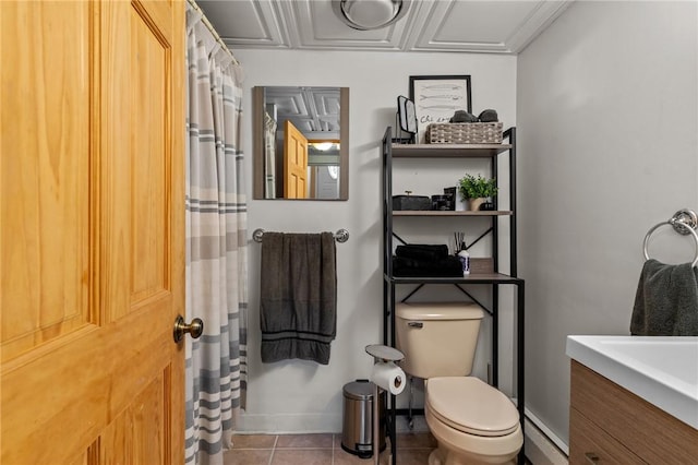 full bathroom with toilet, a baseboard heating unit, a shower with shower curtain, tile patterned flooring, and baseboards