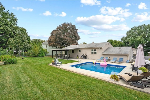 outdoor pool featuring a yard, a grill, and a patio area