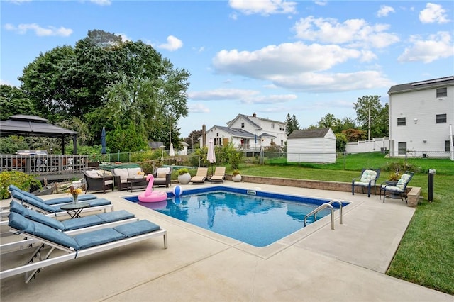 view of pool featuring an outdoor living space, a gazebo, a lawn, a fenced backyard, and a patio